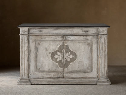 Messina Bell'Arte Buffet: distressed ivory grey cabinet with dark top, two doors with central floral pattern, fluted columns.