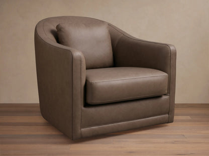 Front view of the Brown Bianca Leather Swivel Chair, featuring a curved back, integrated rounded arms, and a matching accent pillow.