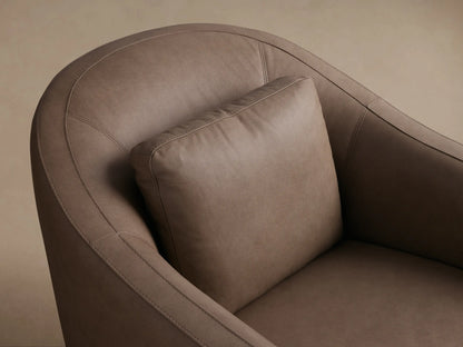 Front view of a taupe Bianca Leather Swivel Chair with rounded arms, a separate seat cushion, and a small back pillow.