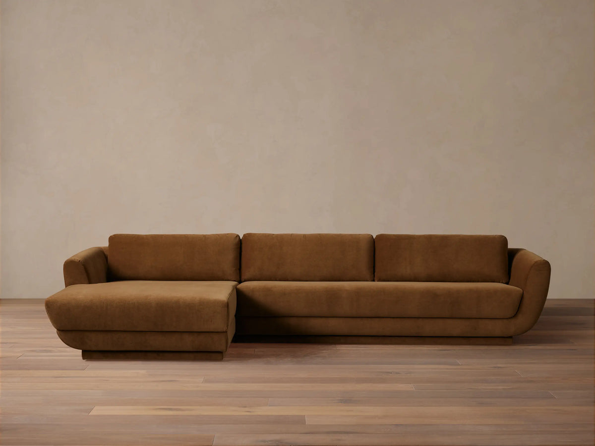 Fontana Two-Piece Chaise Sectional in bronze brown, with a left-facing chaise, featuring modern rounded arms on a wood floor.