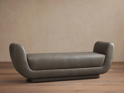 Front view of a dark gray Fontana Leather Bench with curved arms and a sleek, modern design.