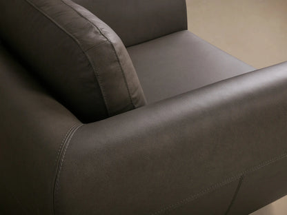 Front view of the dark gray Fontana Leather Swivel Chair, showing its sleek curved arms and a visible swivel base.