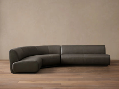 Front view of the Charcoal Gianni Leather Three-Piece Armless Bumper Sectional, featuring a curved corner and straight segments.