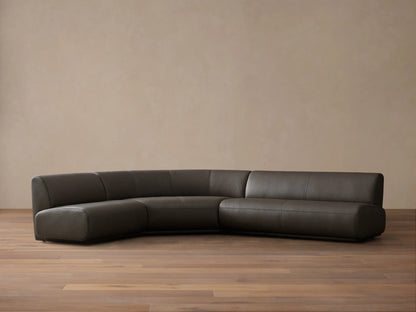 Front view of the Charcoal Gianni Leather Three-Piece Armless Bumper Sectional, featuring a curved corner and straight segments.