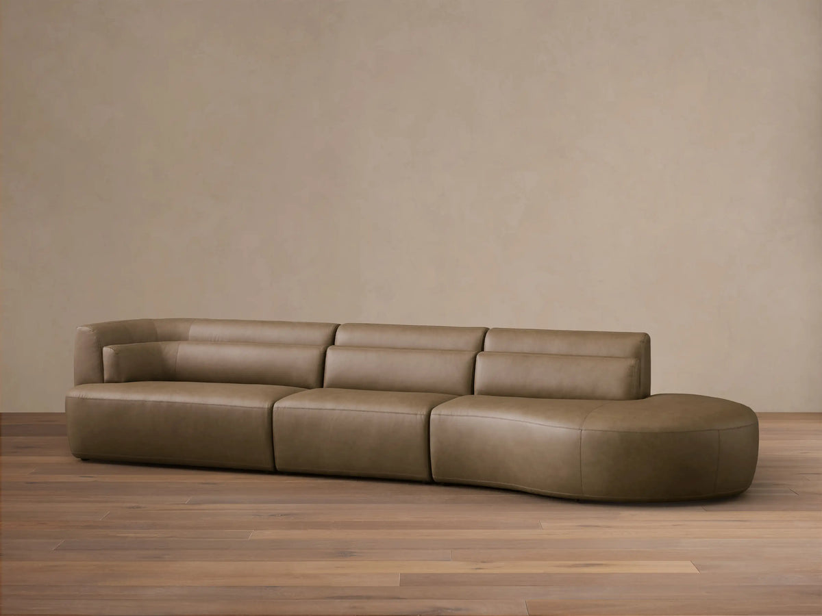Front view of an olive brown Lovina Leather Three-Piece Bumper Sectional, featuring a rounded modular design and horizontal backrest ridges.