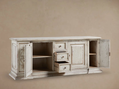 Vittoria Bell'Arte Console in hand-painted Ivory Grey and Dark Rust, featuring ornate carvings, three drawers, and cabinet doors with brass knobs.