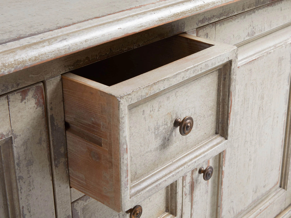 Alt text: Vittoria Bell'Arte Console in Ivory Grey and Dark Rust finish, showcasing open cabinet doors, adjustable shelves, and dovetail drawers with brass knobs.