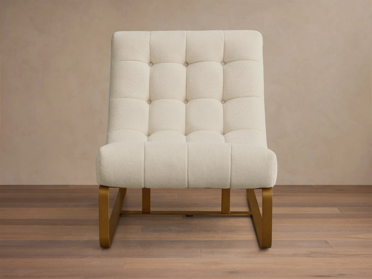 Front view of the cream Callaway Chair, featuring tufted upholstery and gold metal frame.