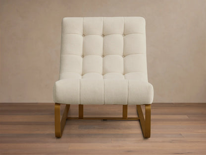 Front view of the cream Callaway Chair, featuring tufted upholstery and gold metal frame.