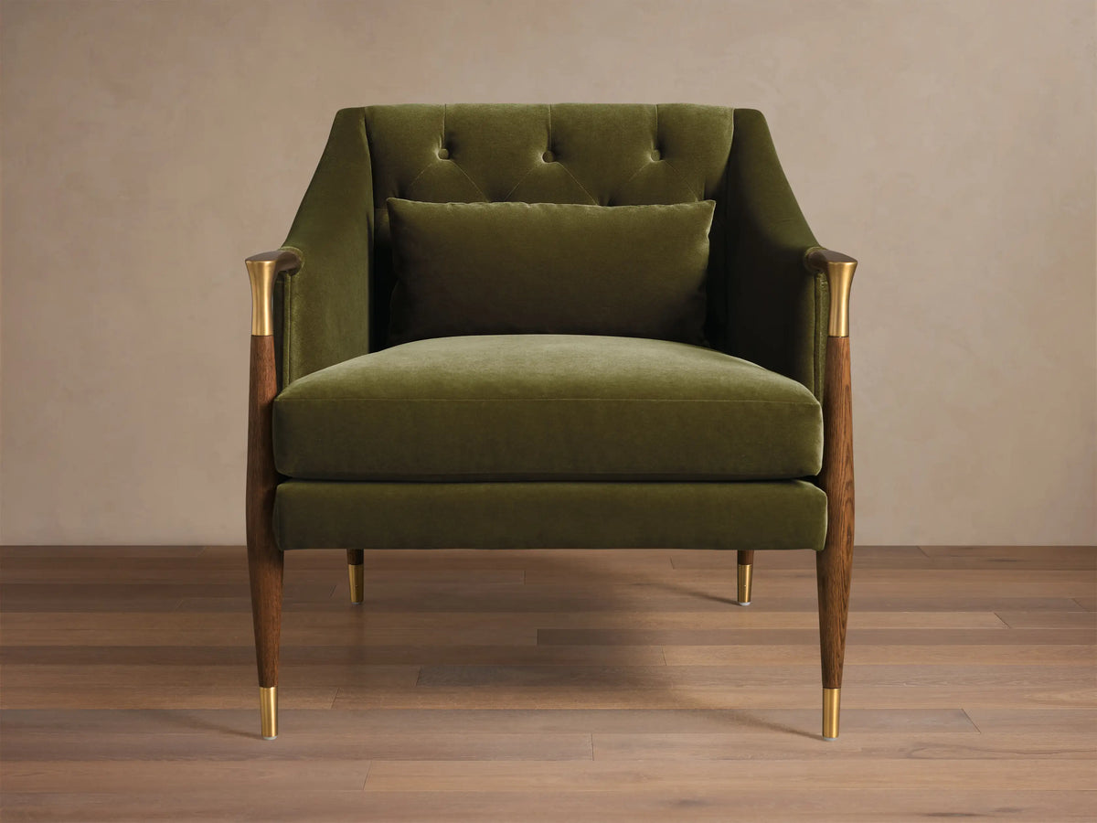 Rear-side view of an Olive Green Fisher Club Chair with tapered wooden legs, brass caps, and wooden armrest details.