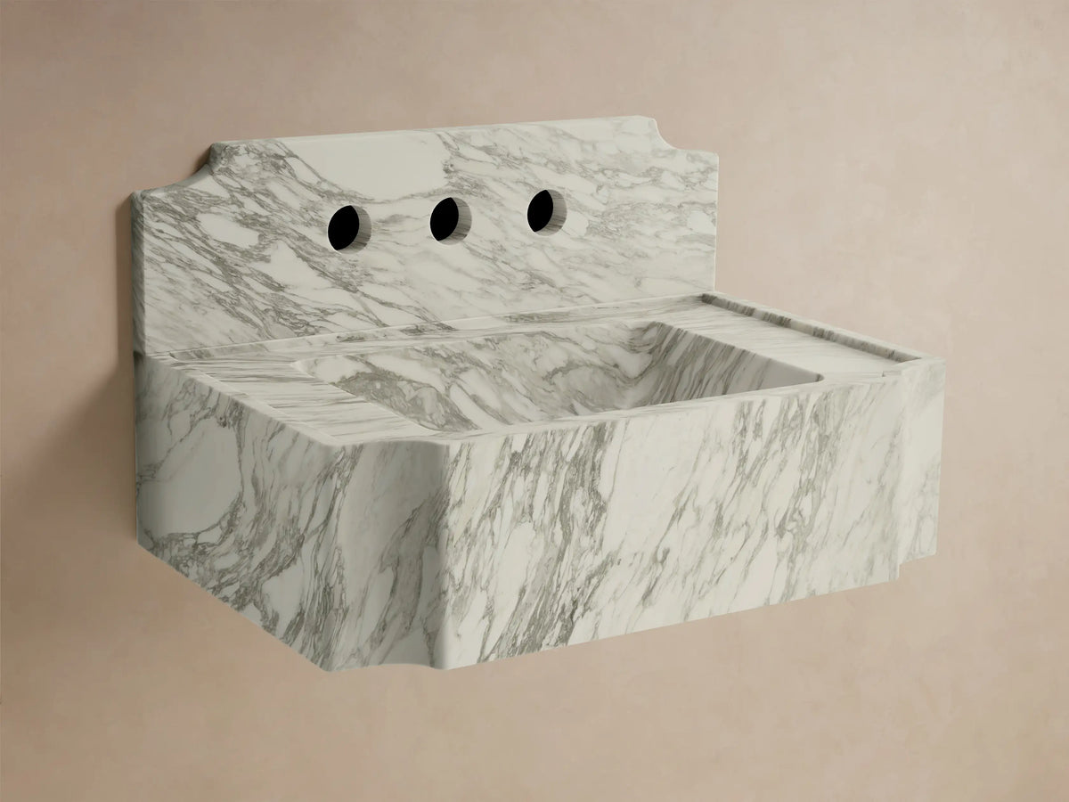 Front view of the white marble Dottie Wall-Mounted Sink with Backsplash, featuring grey veining and chrome wall-mounted faucets.