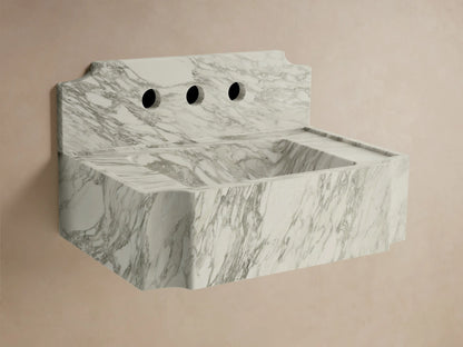 Front view of the white marble Dottie Wall-Mounted Sink with Backsplash, featuring grey veining and chrome wall-mounted faucets.
