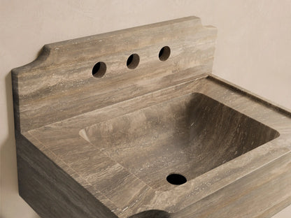 Front view of Dottie Wall-Mounted Sink with Backsplash, brown and beige natural stone with horizontal striations, three faucet holes.