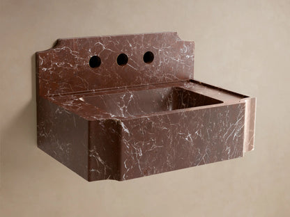 Front view of a reddish-brown marble Dottie Wall-Mounted Sink with Backsplash, with white veining and a chrome wall faucet.