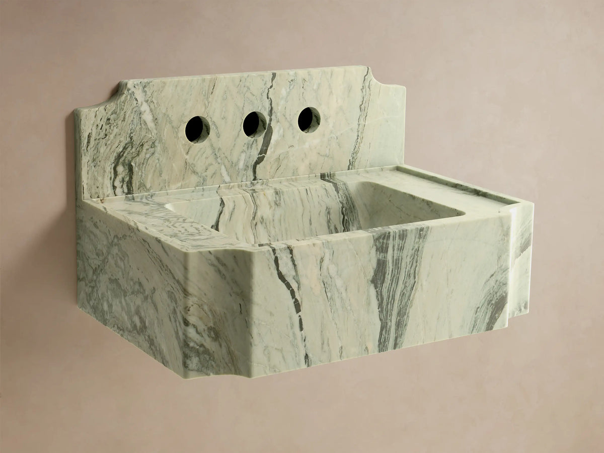Front view of a green marble Dottie Wall-Mounted Sink with Backsplash, featuring black veining and a chrome wall-mounted faucet.