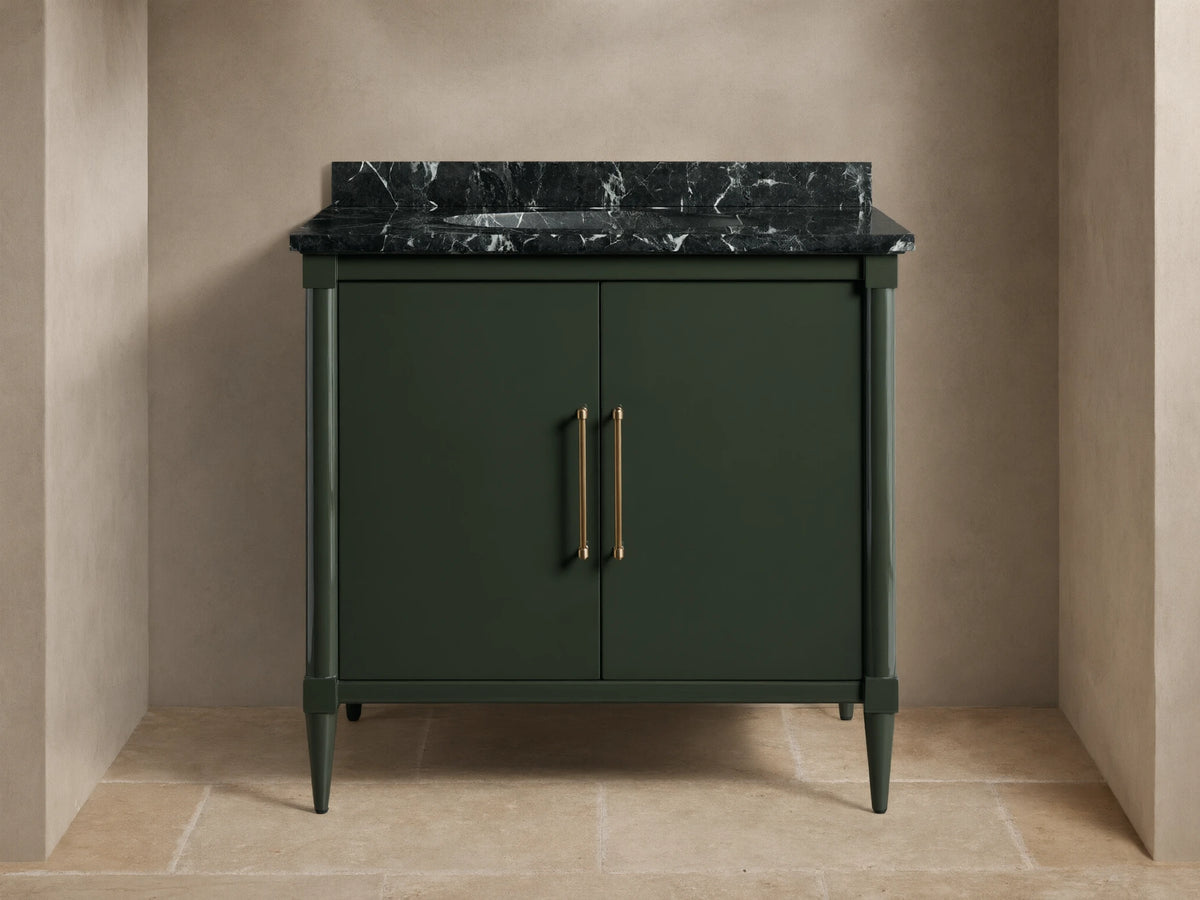 Front view of the dark green Oakleigh Single Vanity with a dark veined marble top, two doors, and gold pull handles.