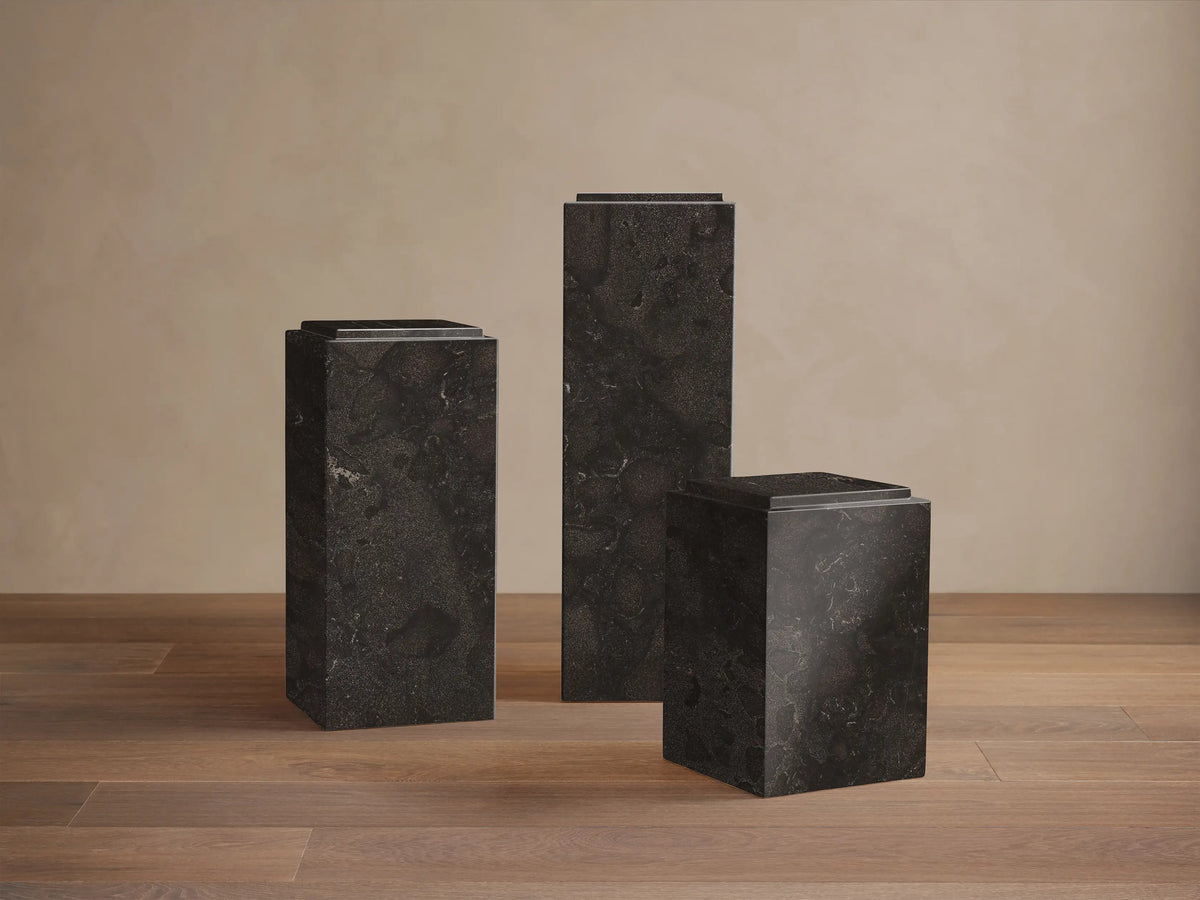 Front view of the dark grey honed stone Marmont Pedestal, a tall rectangular column with matte finish and light veining.