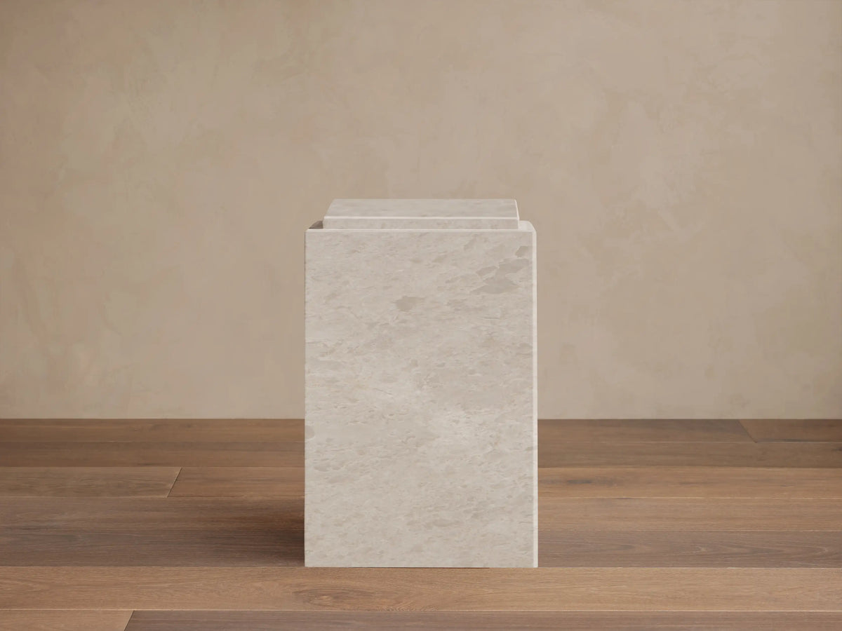 Front view of a light gray Marmont Pedestal, a rectangular stone pillar with subtle natural veining and a matte finish.