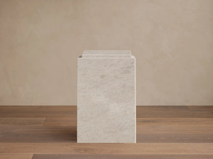 Front view of a light gray Marmont Pedestal, a rectangular stone pillar with subtle natural veining and a matte finish.