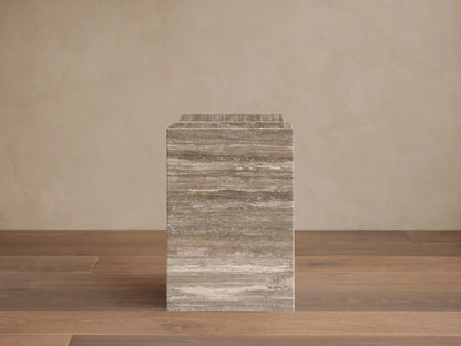 Front view of the Marmont Pedestal, a rectangular stone pedestal with horizontal veining in shades of gray, brown, and beige.