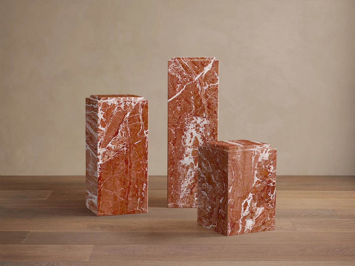 Front view of the reddish-brown and white veined Marmont Pedestal, a rectangular column with a matte finish.