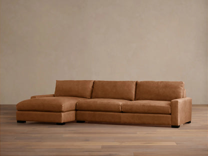 Remington Leather Two-Piece Chaise Sectional, tan leather, left-facing chaise, on wooden floor with light wall.