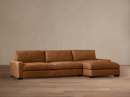 Remington Leather Two-Piece Chaise Sectional in warm brown leather, with a right-facing chaise, on a light wood floor.