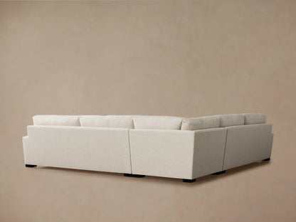 Light oatmeal-colored Remington Three-Piece Corner Sectional showing a plush back cushion, wide armrest, and textured seat.