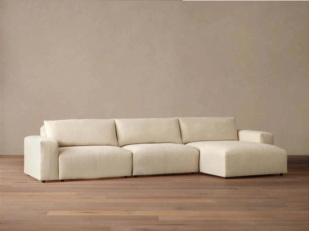 Keegan 3-piece sectional, cream textured fabric, right-facing chaise, modern style in a neutral room.
