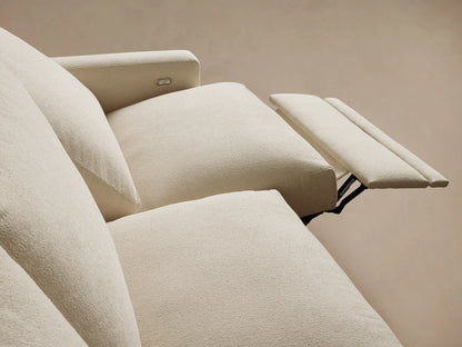 Front view of the cream Remington Three-Piece Motion Sofa, with three seats, thick cushions, and square arms.