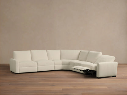 Front view of the Cream Remington Five-Piece Motion Corner Sectional, an L-shaped sofa with armrests on both ends and dark bases.