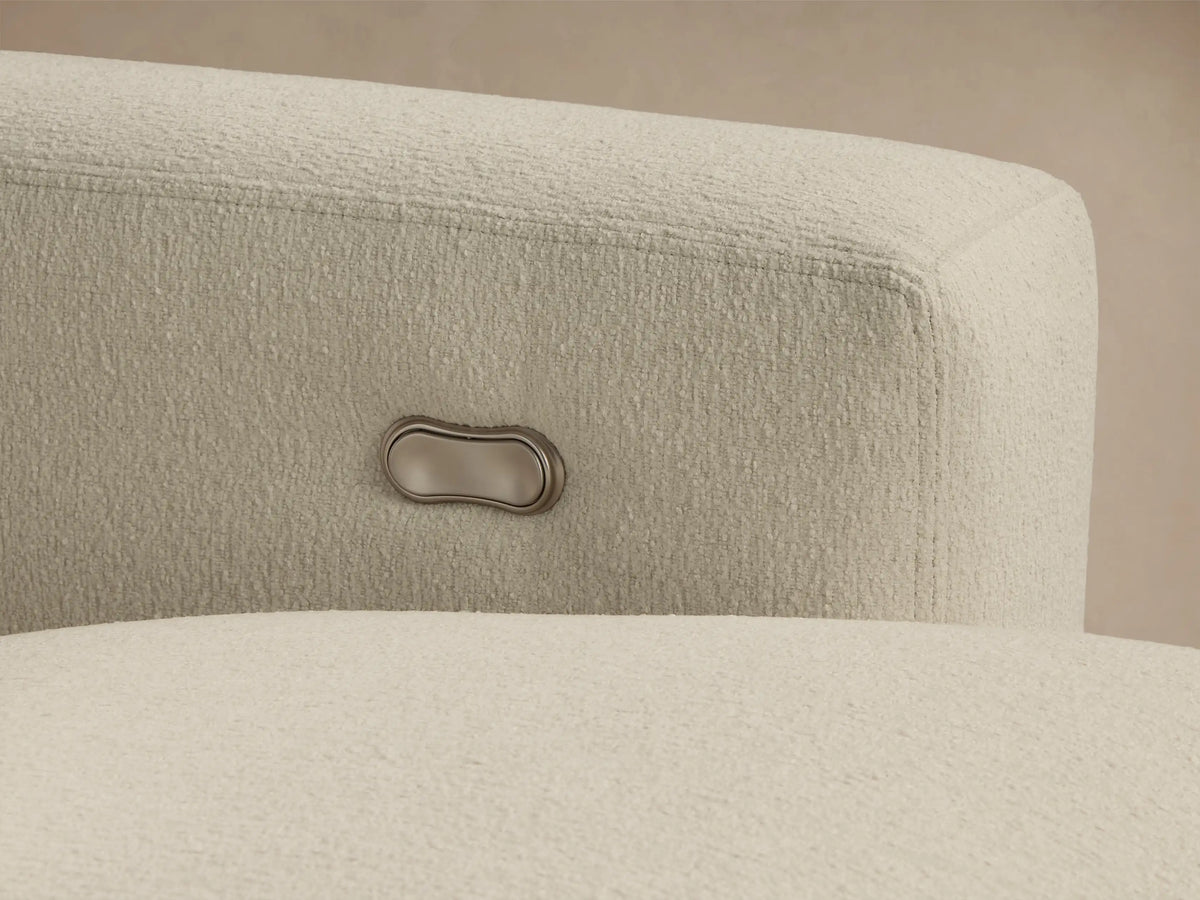 Front view of the cream Remington Five-Piece Motion Corner Sectional with one recliner extended.