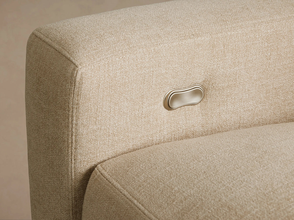 Front view of the beige Remington Motion Recliner, upholstered in a textured fabric with clean, modern lines and straight arms.