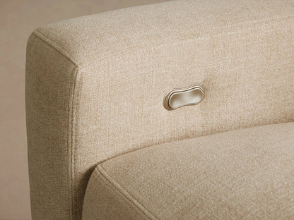 Front view of the beige Remington Motion Recliner, upholstered in a textured fabric with clean, modern lines and straight arms.