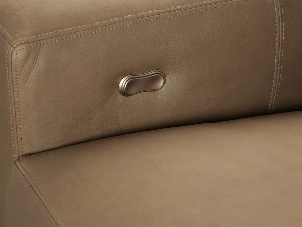 Remington tan leather three-piece motion sofa. Modern design with three distinct sections, visible from the front in a neutral room.