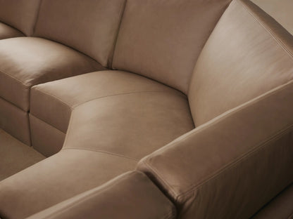Remington Leather Six-Piece Motion Sectional: Close-up of taupe leather with stitching and an oval metallic silver control button.