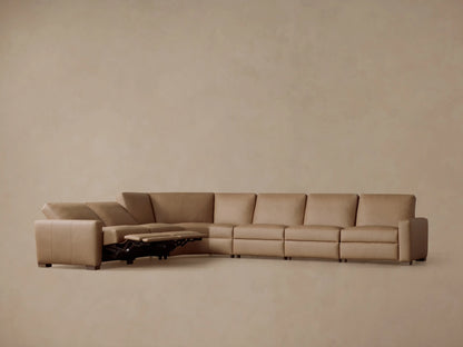 Remington six-piece L-shaped motion sectional in tan leather, with three extended recliners, on a neutral background.