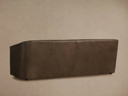 Ellison Leather Sofa corner view showcasing rich brown leather with visible natural texture, sleek armrest, and smooth surface.
