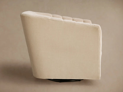 Front view of a Beige Ellison Channel-Stitched Swivel Glider with vertical channel stitching on the back and a black metal swivel base.