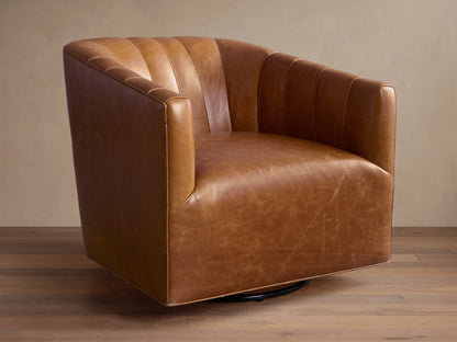 Ellison Leather Channel-Stitched Swivel Chair: rich brown leather, channel-stitched back, black swivel base, angled on wood floor.