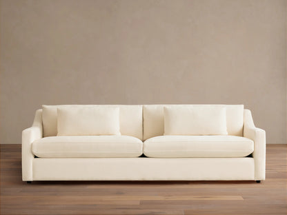 Front view of a cream Ashby Sofa with two large seat cushions, two back cushions, and two rectangular throw pillows.