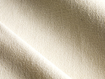 Rear view of the cream Ashby Sofa, highlighting its clean lines and simple, modern design.