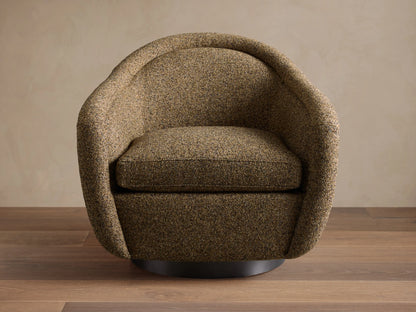 Two dark brown textured Ashbury Swivel Chairs with curved backs facing a light beige sofa in a cozy living room.