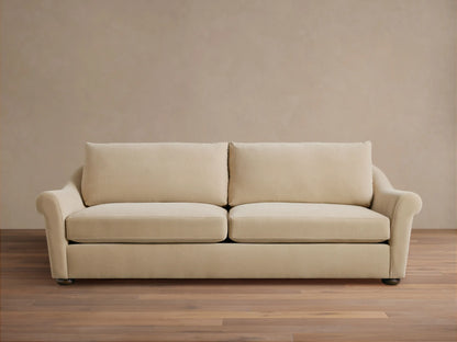Front view of Cream Archwood Sofa with two seat and back cushions, rolled arms, and dark feet.