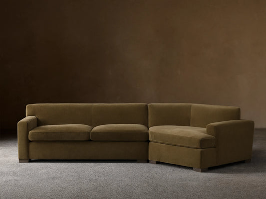 Front view of the olive green velvet Bronte Two-Piece Cuddle Chaise Sectional, featuring a left-arm chaise.