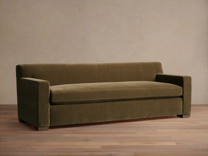 Front view of the olive green Bronte Bench-Seat Sofa with a single bench cushion and wide square arms.