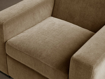 Bronte Chair, modern, boxy armchair, upholstered in soft, textured tan fabric, with square arms and plush seat cushion.