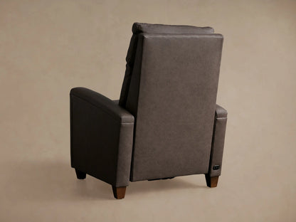 Colfax Leather Motion Recliner in taupe gray, side view, fully reclined with backrest tilted back and footrest elevated.