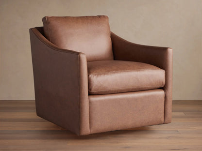 Branson Leather Swivel Chair, rich brown, angled slightly right. Plush seat & back cushions, wide arms on wood floor.