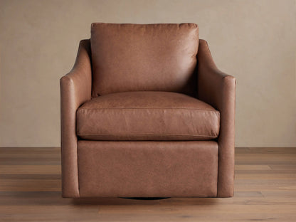 Branson Leather Swivel Chair, rich brown, angled slightly right. Plush seat & back cushions, wide arms on wood floor.